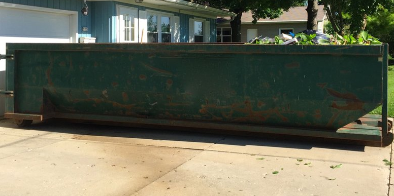 How Should You Cover Your Dumpster When Renting